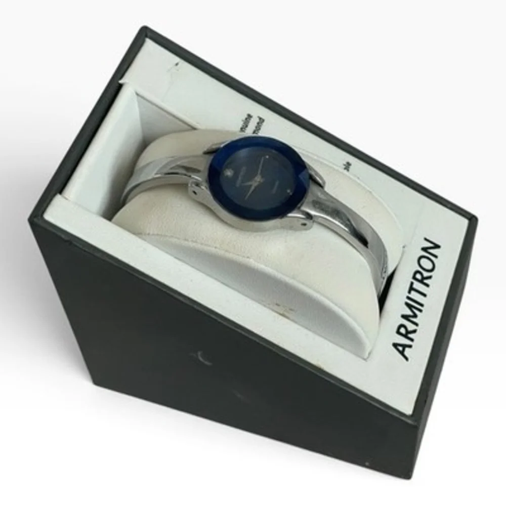 Armitron Womens Watch Genuine Diamond Blue Dial Silver Bangle Bracelet VG